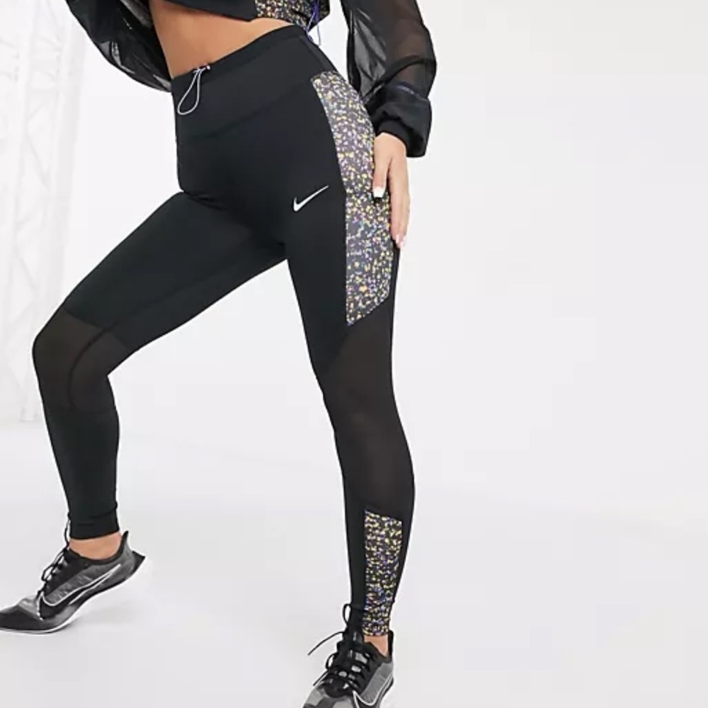 Nike Running Fast cropped leggings in black with back zipper pocket